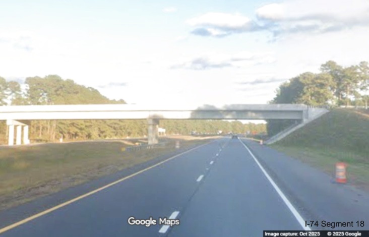 Image of completed Lake Road bridge over US 74/76 East in Lake Waccamaw, Google Maps 
	  Street View, October 2025