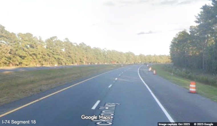 Image of US 74/76 East after the Lake Road bridge in Lake Waccamaw showing that
	  the second set of U-Turn ramps have been removed, Google Maps Street View, October 2025