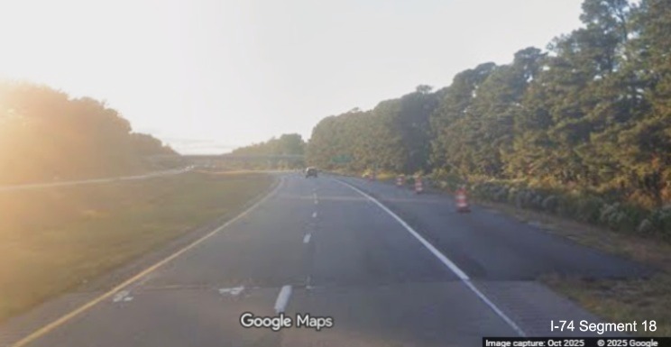 Image of start of interstate standard shoulders prior to the Lake Road bridge over 
	  US 74/76 (Future I-74) West in Lake Waccamaw, Google Maps Street View, October 2025