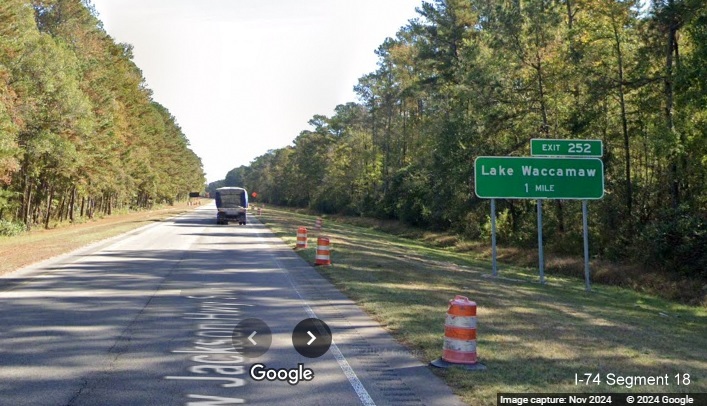 Image of recently placed 1 mile advance sign for Lake Waccamaw exit on US 74/76 (Future I-74) East,
        Google Maps Street View, November 2024