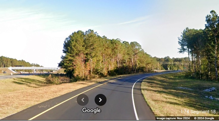 Image traveling up the new ramp for Lake Waccamaw exit on US 74/76 (Future I-74) East, Google 
         Maps Street View, November 2024