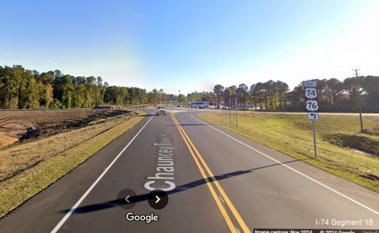 Image of driving through the new roundabout for Lake Waccamaw exit on US 74/76 (Future I-74) East, 
        Google Maps Street View, November 2024