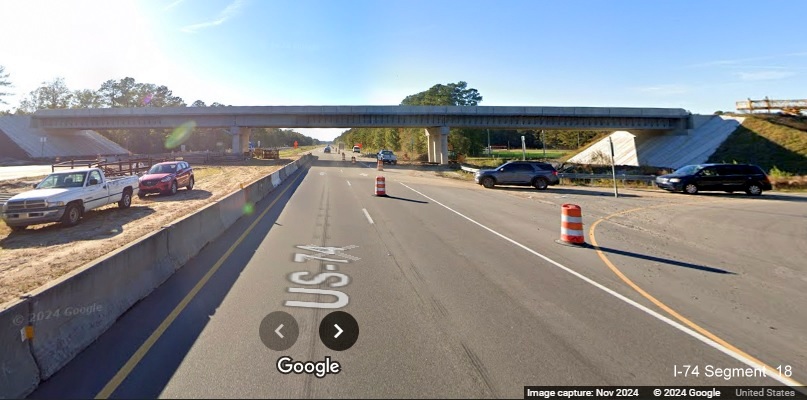 Image of new Old Lake Road bridge under construction and traffic still using current intersection
          on US 74/76 West (Future I-74 West, Google Maps Street View, November 2024