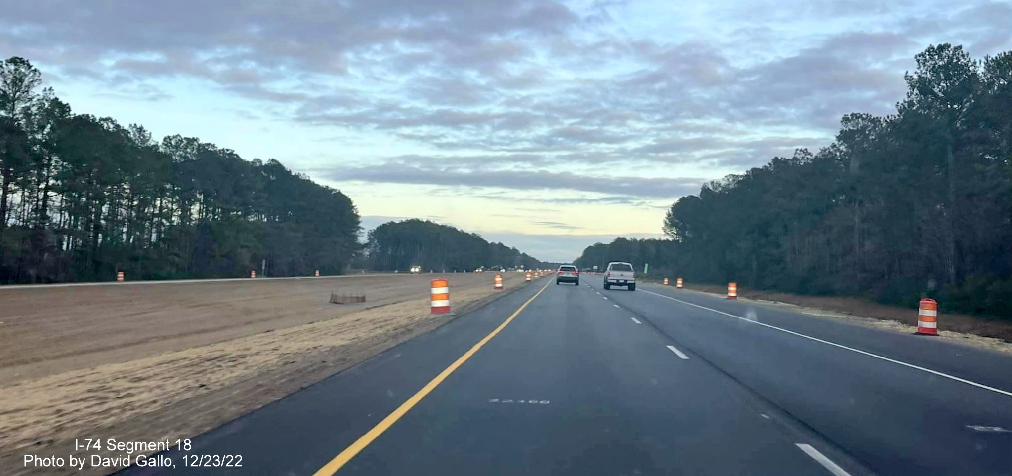 Image of graded median in Lake Waccamaw interchange work zone on US 74/76 East, by David Gallo, December 2022