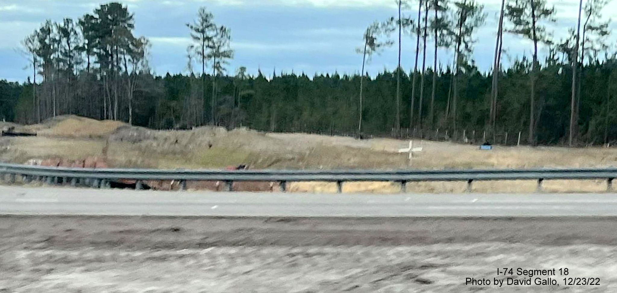 Image of clearing for future Old Lake Road bridge in the Lake Waccamaw interchange work zone on US 74/76 East, by David Gallo, December 2022