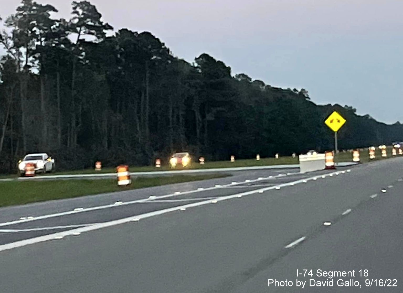 Image of trees cut down along US 74 West as part of new Lake Waccamaw interchange construction, by David Gallo, September 2022