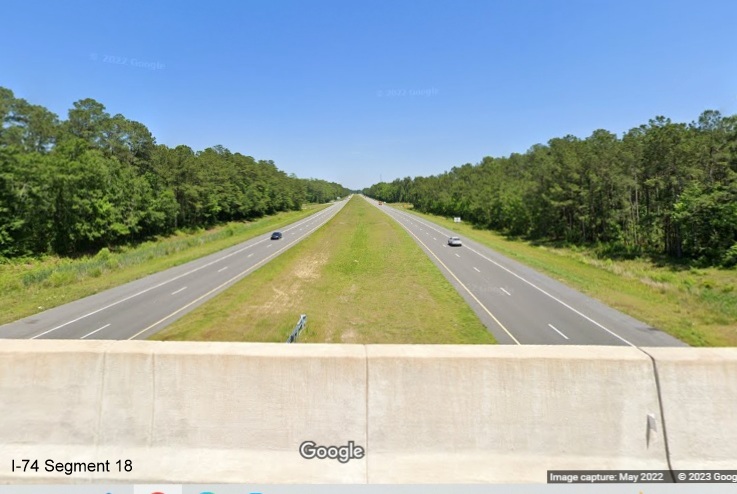 Image looking east from the Hallsboro Road Bridge over interstate standard US 74/76 (Future I-74) in Hallsboro, Google Maps Street View image, May 2022
