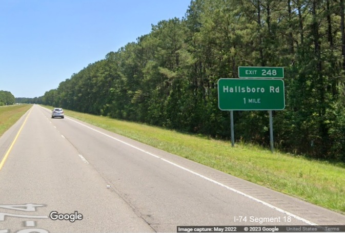 Image of ground mounted 1 mile advance sign for new Hallsboro Road exit on US 74/76 (Future I-74) East, Google Maps Street View, May 2022