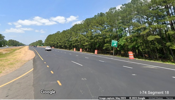 Image of entering US 74/76 West from u-turn ramp in Lake Waccamaw interchange project work zone 
          from US 74/76 East, Google Maps Street View, May 2023