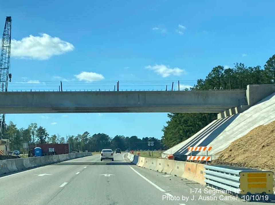 Image of new bridge support girders recently installed for future Hallsboro Road bridge over US 74/76 (Future I-74), by J. Austin Carter