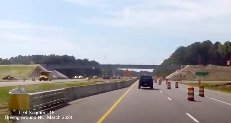 Image of future Chauncey Town Road bridge at Lake Waccamaw interchange, screen shot from 
        video by Driving Around NC, April 2024