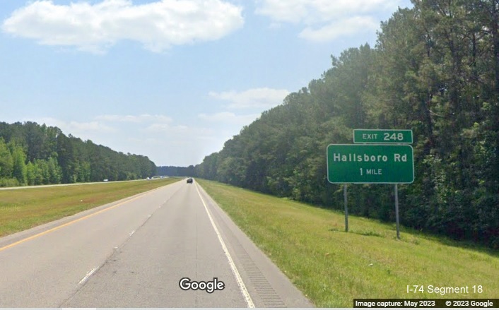 Image of ground mounted 1 mile advance sign for Hallsboro Road exit on US 74/76 East in Hallsboro, Google Maps Street View, May 2023