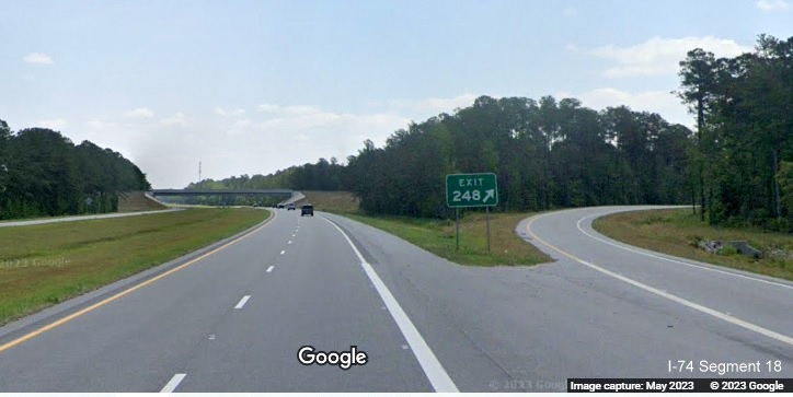 Image of gore sign for Hallsboro Road exit on US 74/76 East in Hallsboro, Google Maps Street View, May 2023