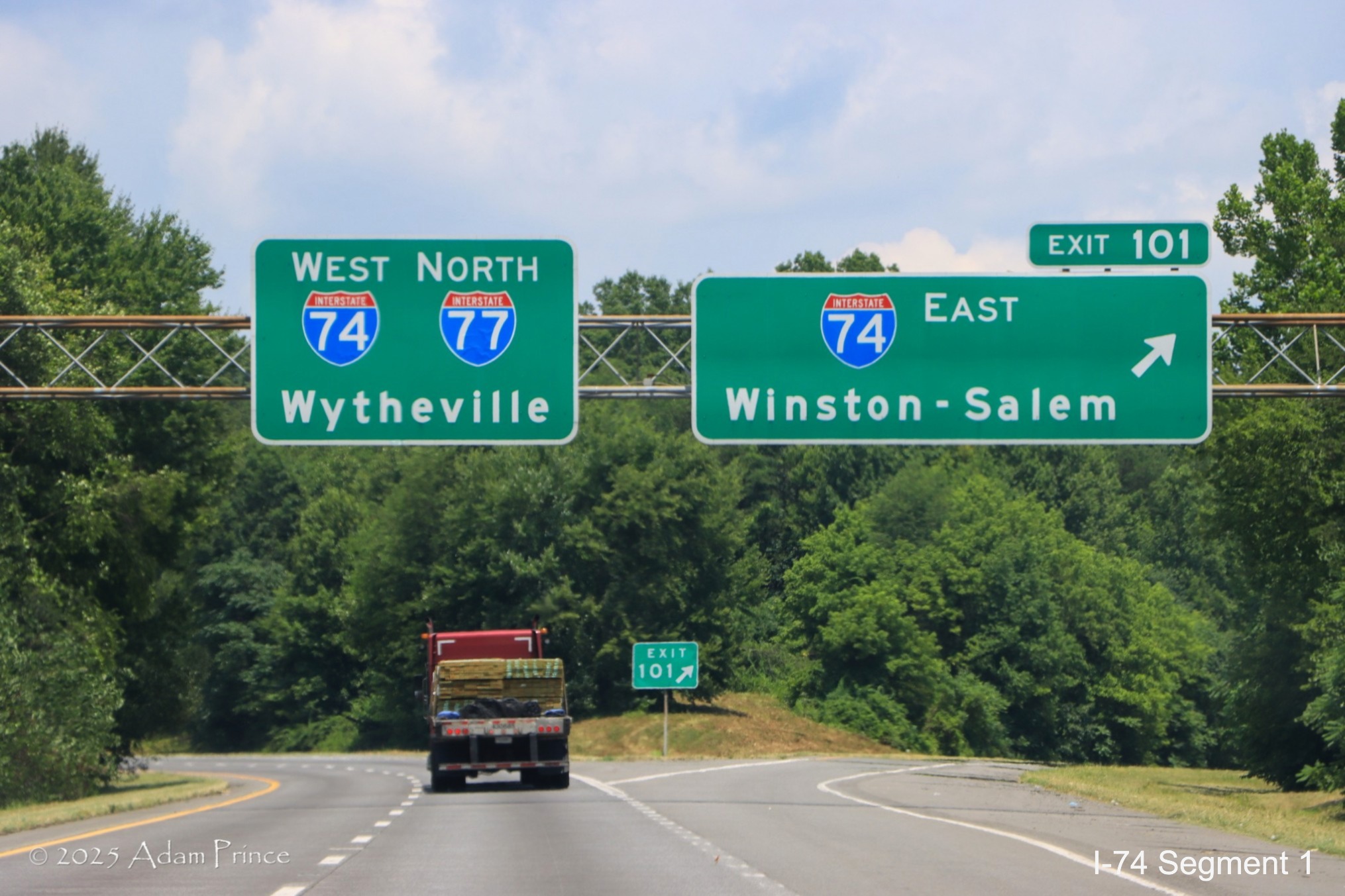 Image of I-74 West/I-77 North pull through sign at ramp sign for I-74 East
	  exit in Surry County, Adam Prince, June 2025