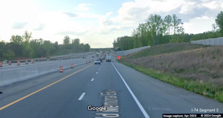 Image of traffic on US 52 North using future C/D lane from Winston-Salem Northern Beltway 
       interchange while current US 52 South traffic uses future US 52 North lanes, Google Maps Street View, April 2024