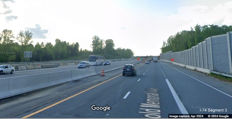 Image of traffic on US 52 North using future C/D lane from Winston-Salem Northern Beltway 
       at merge with traffic from NC 65, Google Maps Street View, April 2024