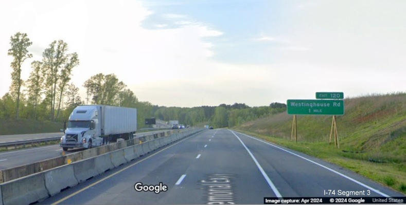 Image of traffic on US 52 North at 1 Mile advance sign for Westinghouse Road using 1/2 of 
        permanent lanes while other half is for current US 52 South traffic, Google Maps Street View, April 2024