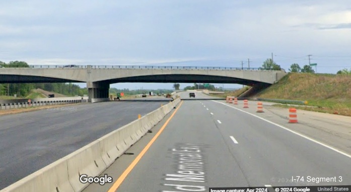 Image of US 52 South (Future I-74 East) lanes passing under the NC 65 bridge in the
        Beltway interchange construction zone, Google Maps Street View, April 2024