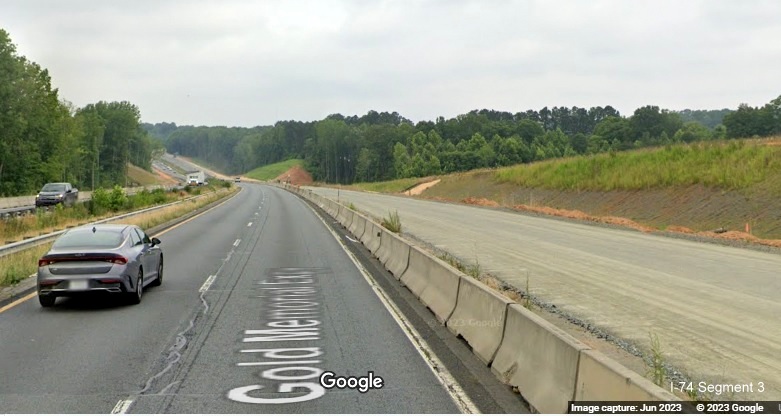Image of US 52 North lanes under construction between NC 65 and Westinghouse Road as part of 
       Winston-Salem Northern Beltway interchange project, Google Maps Street View, June 2023