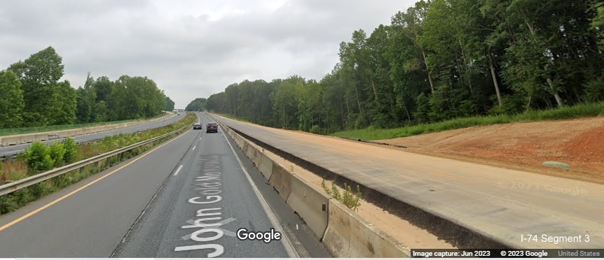 Image of paved US 52 North lanes approaching Westinghouse Road as part of 
       Winston-Salem Northern Beltway interchange project, Google Maps Street View, June 2023