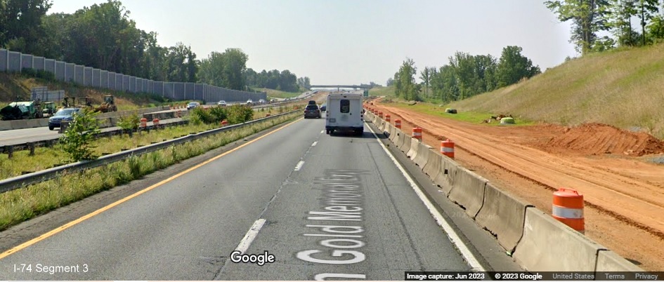 Image of traffic on US 52 South approaching NC 65 exit under construction as part of 
       Winston-Salem Northern Beltway interchange project, Google Maps Street View, June 2023