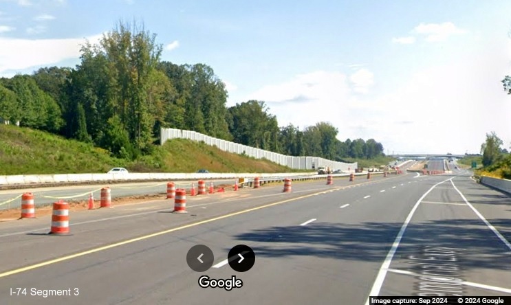 Image of start of split of lanes between NC 74 East and the new US 52 South exit ramps prior to
        NC 65 in Rural Hall, Google Maps Street View, September 2024