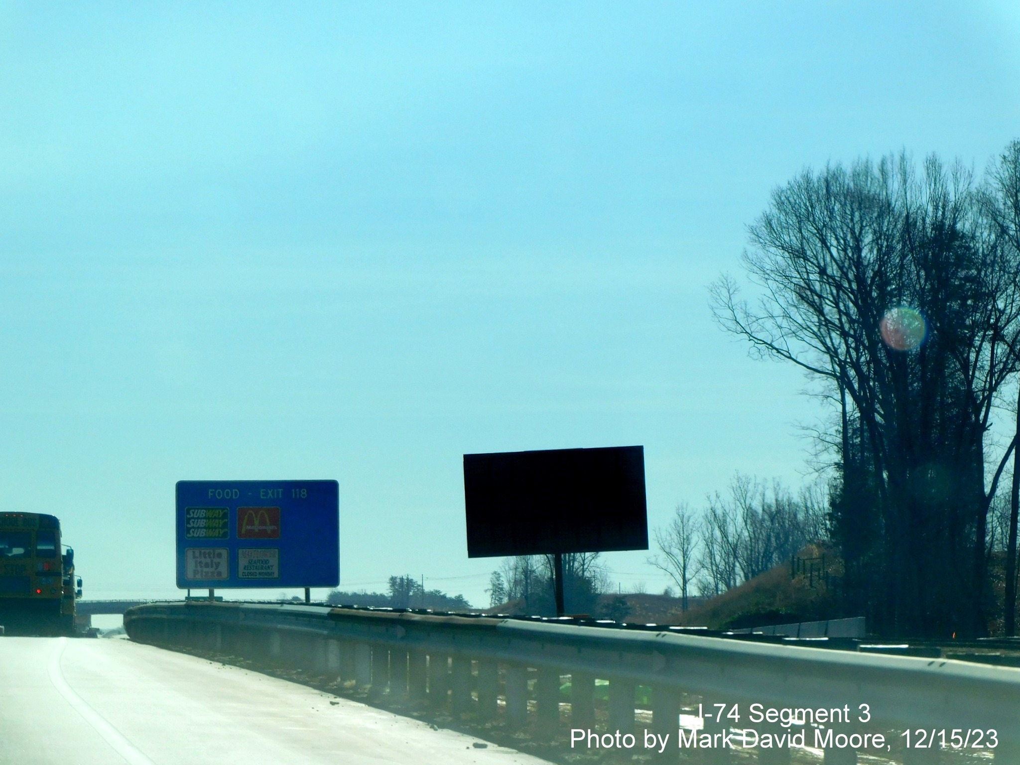 Image of temporary 1 mile VMS advance sign for completed Winston-Salem Northern Beltway interchange
        after the NC 65 exit, by Mark David Moore, December 2023