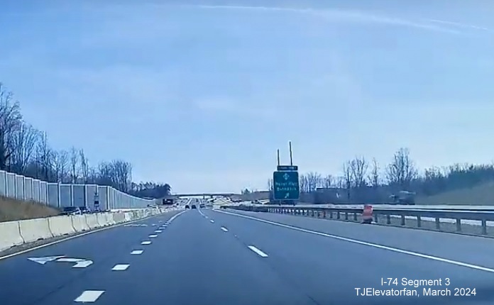 Dashcam video image of US 52 South (Future I-74 East) approaching the NC 65 exit, video by 
        TJElevatorfan, posted March 16, 2024