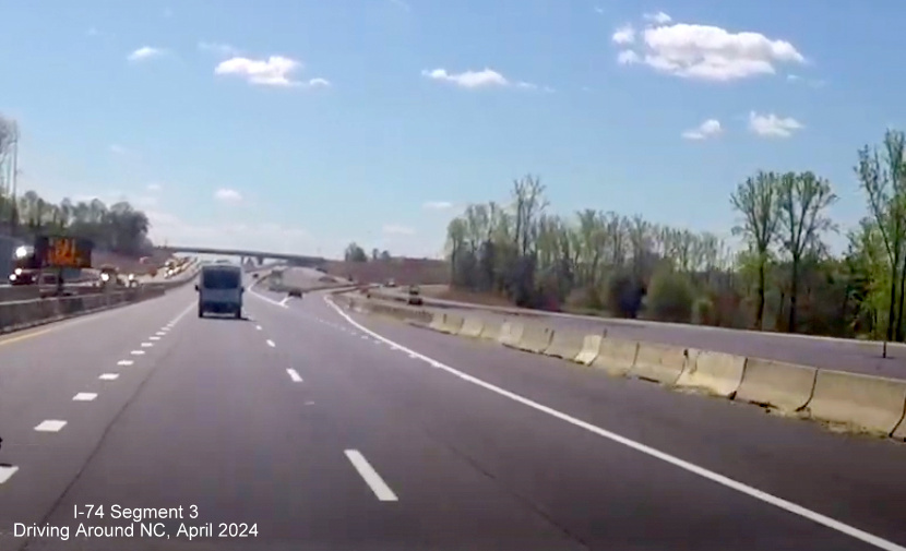 Image of US 52 South at the NC 65 interchange and approaching the Winston-Salem Beltway interchange 
        still under construction, screen grab from Driving Around NC video, April 2024