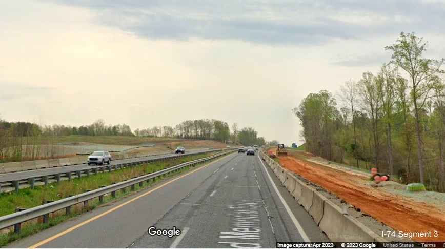 Image of construction zone for future I-74/Winston-Salem Beltway beyond Westinghouse 
        Road on US 52 South (Future I-74 East), Google Maps Street View, April 2023