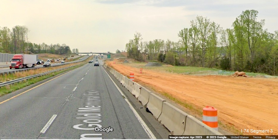 Image lane widening work prior to NC 65 exit in construction zone for future I-74/Winston-Salem 
        Beltway on US 52 South (Future I-74 East), Google Maps Street View, April 2023