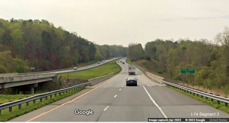Image of completed modern standard bridge over US 52 in Surry County, Google Maps Street View 
        images, April 2023