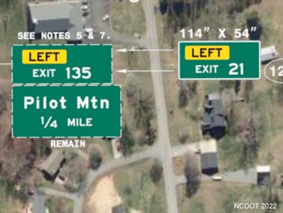 Image of plan for new Left exit number tab with I-74 milepost number to be placed on sign for 
        Pilot Mountain on US 52 South in Surry County, NCDOT August 2022
