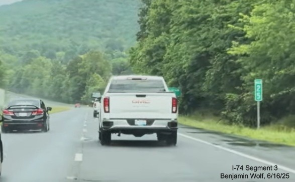Image of new Mile 25 marker on US 52 South (Future I-74 East), screen grab 
	  from Benjamin Wolf video, June 2025