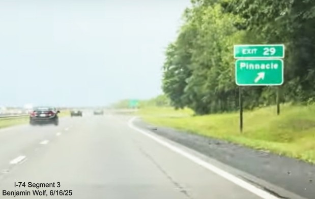 Image of renumbered ground mounted ramp sign for the Pinnacle exit on US 52 South
	  (Future I-74 East), screen grab from Benjamin Wolf video, June 2025