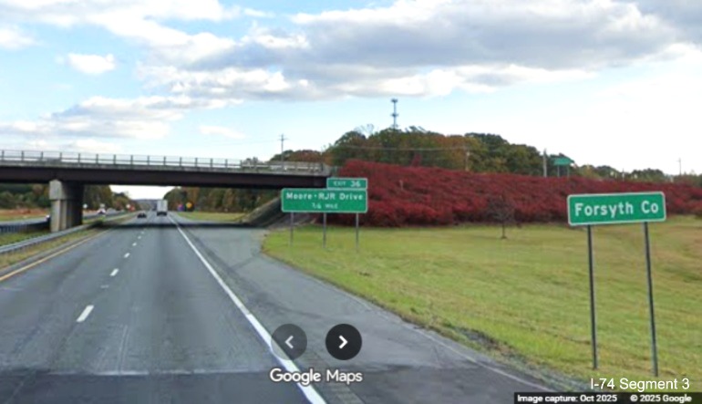 Image of renumbered 1 Mile advance sign for the Moore/RJR Drive exit on 
	  US 52 South (Future I-74 East), Google Maps Street View, October 2025