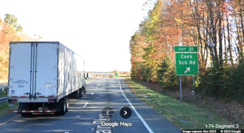 Image of renumbered exit sign for the Cook School Road exit in Mt. Airy on 
	  US 52 South (Future I-74 East), Google Maps Street View, November 2025