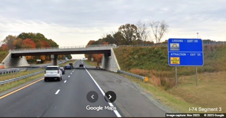 Image of renumbered blue Lodging/Attractions sign for the King/Tobaccoville 
	  exit on US 52 South (Future I-74 East), Google Maps Street View, November 2025