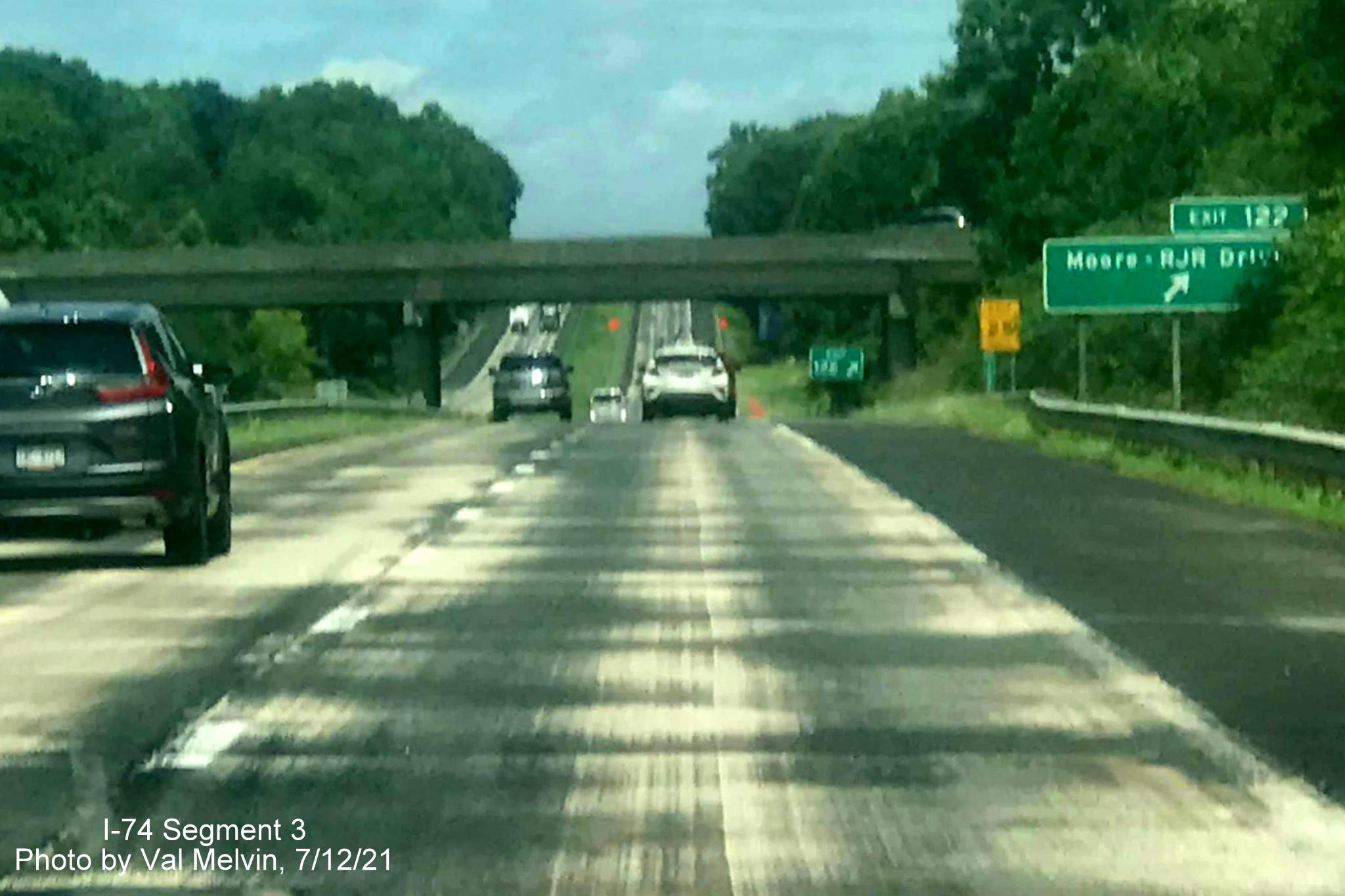 Image of newly widened shoulders on US 52 North (Future I-74 West) in Forsyth County approaching the
        Moore-RJR Drive exit, by Val Melvin, July 2021