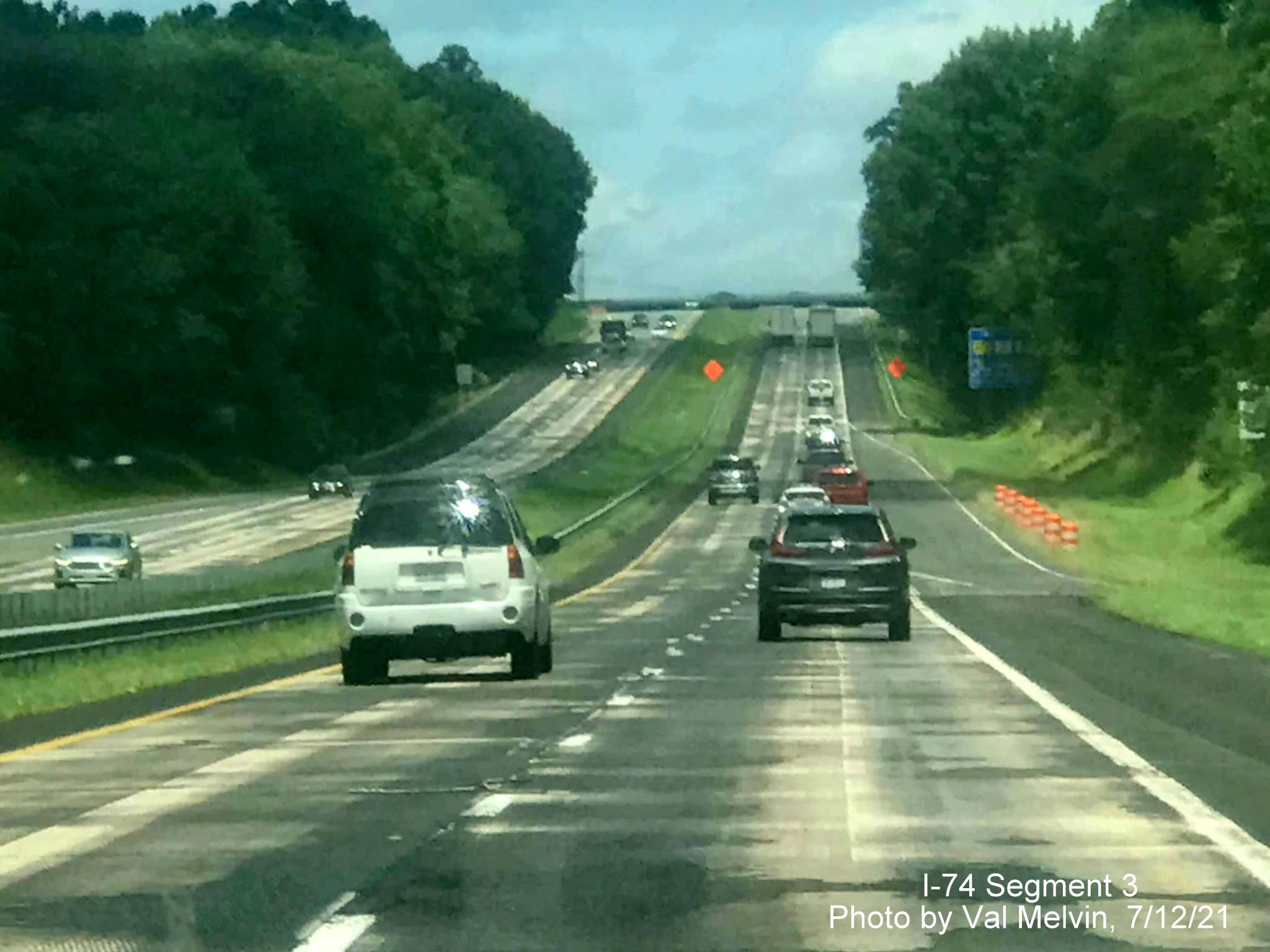 Image of newly widened shoulders on US 52 North (Future I-74 West) in Forsyth County after the
        Moore-RJR Drive exit, by Val Melvin, July 2021