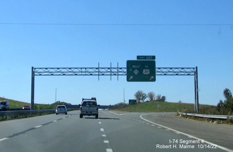 Image of overhead exit sign for NC 74 (Future I-74) West, Winston-Salem Northern Beltway exit on US 421, 
        Salem Parkway, October 2022