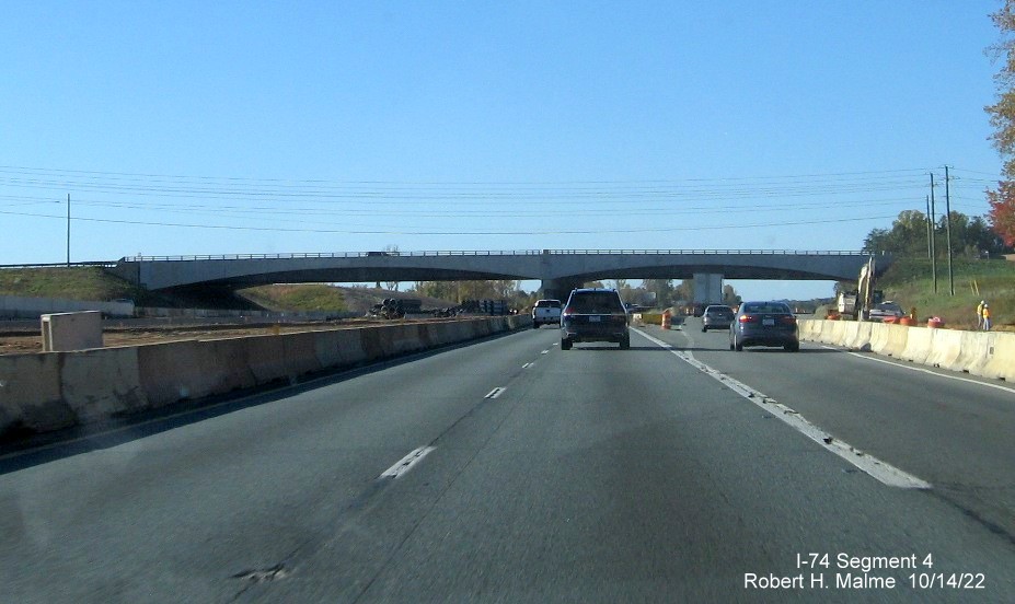 Image of new NC 65 bridge as seen from US 52 lanes lanes in Winston-Salem 
          Northern Beltway interchange construction zone, October 2022