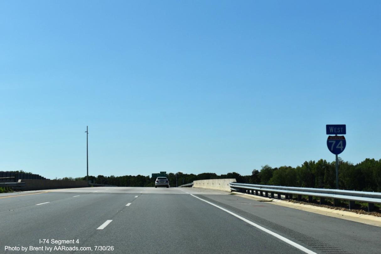 Image of new West I-74 reassurance marker after the US 311 exit on the
	 open section of the Winston-Salem Northern Beltway, Brent Ivy at AARoads.com, July 30, 2026