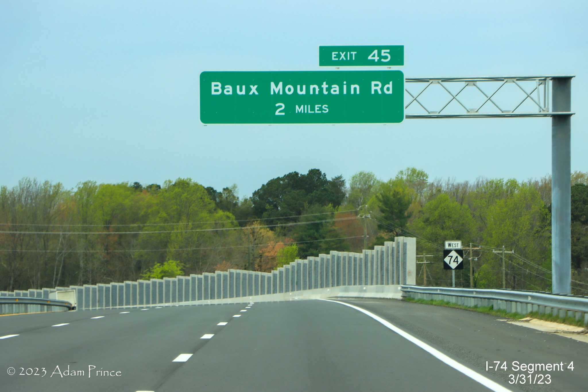 Image of 2 Miles advance sign for Baux Mountain Road exit on NC 74 (Future I-74) West/Winston-Salem 
        Northern Beltway, Adam Prince, March 2023