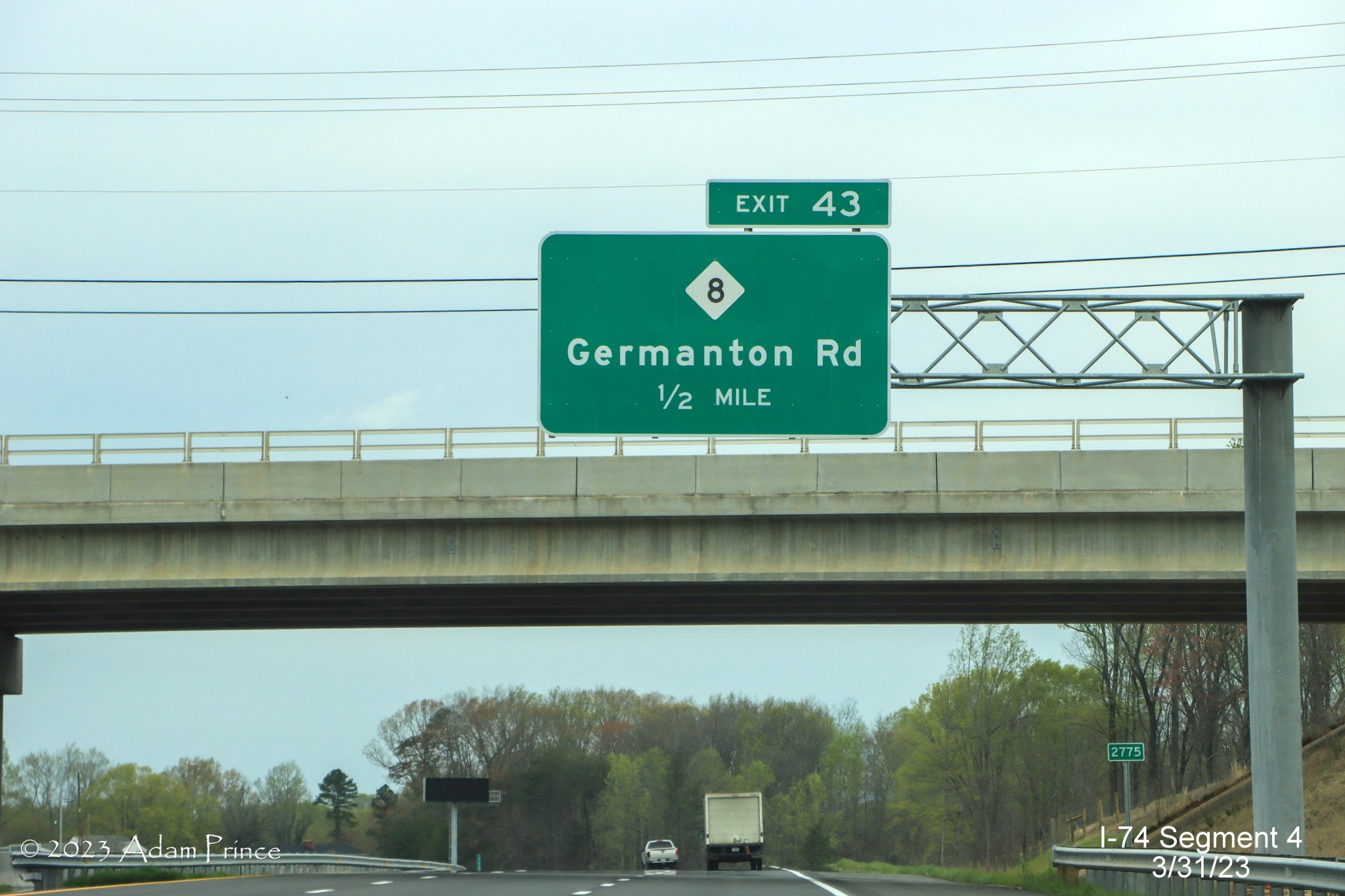 Image of 1 Mile advance sign for NC 8/Germanton Road exit on NC 74 (Future I-74) West/Winston-Salem 
        Northern Beltway, Adam Prince, March 2023