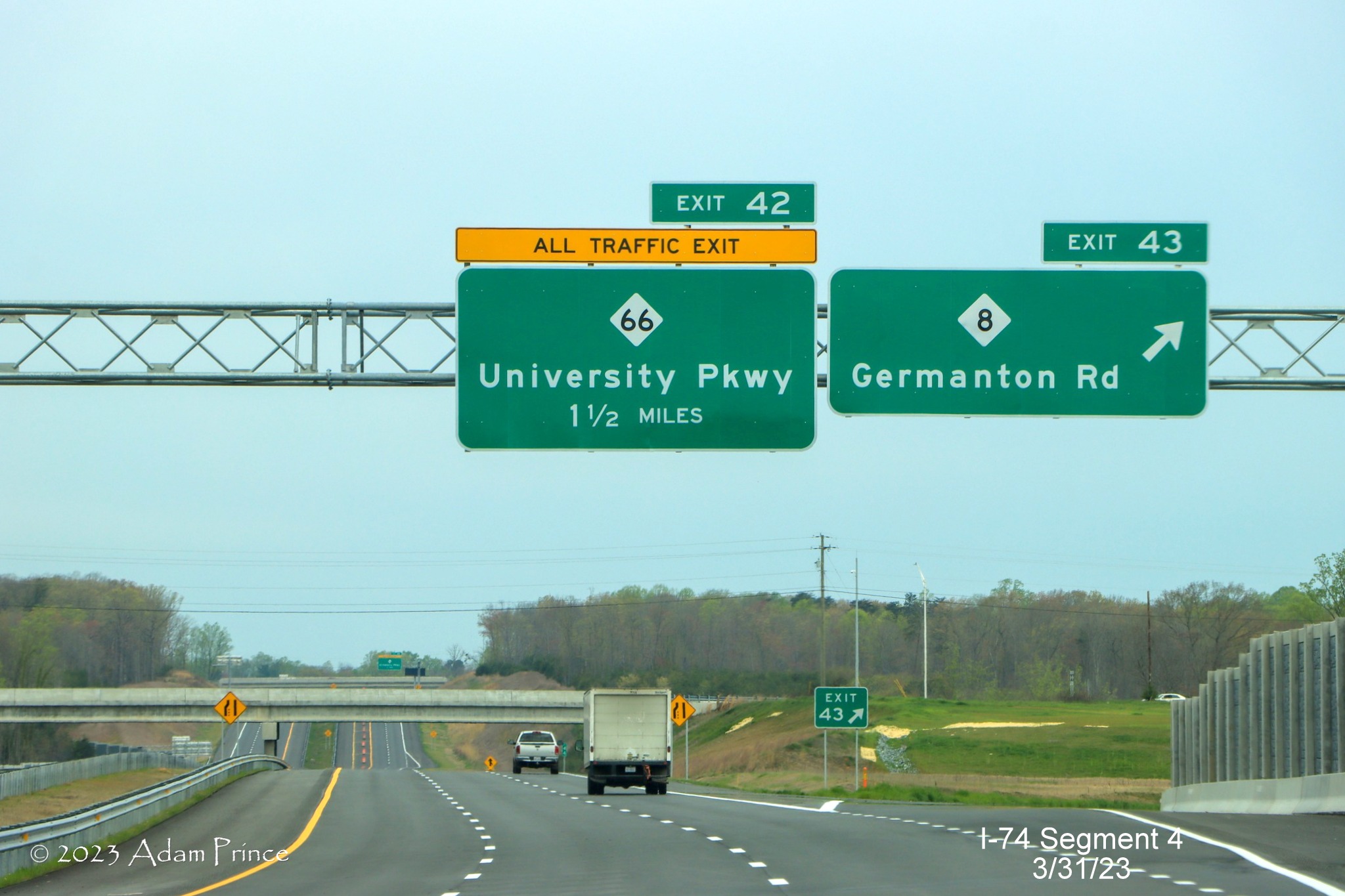 Image of overhead signage at exit for NC 8/Germanton Road on NC 74 (Future I-74) West/Winston-Salem 
        Northern Beltway, Adam Prince, March 2023