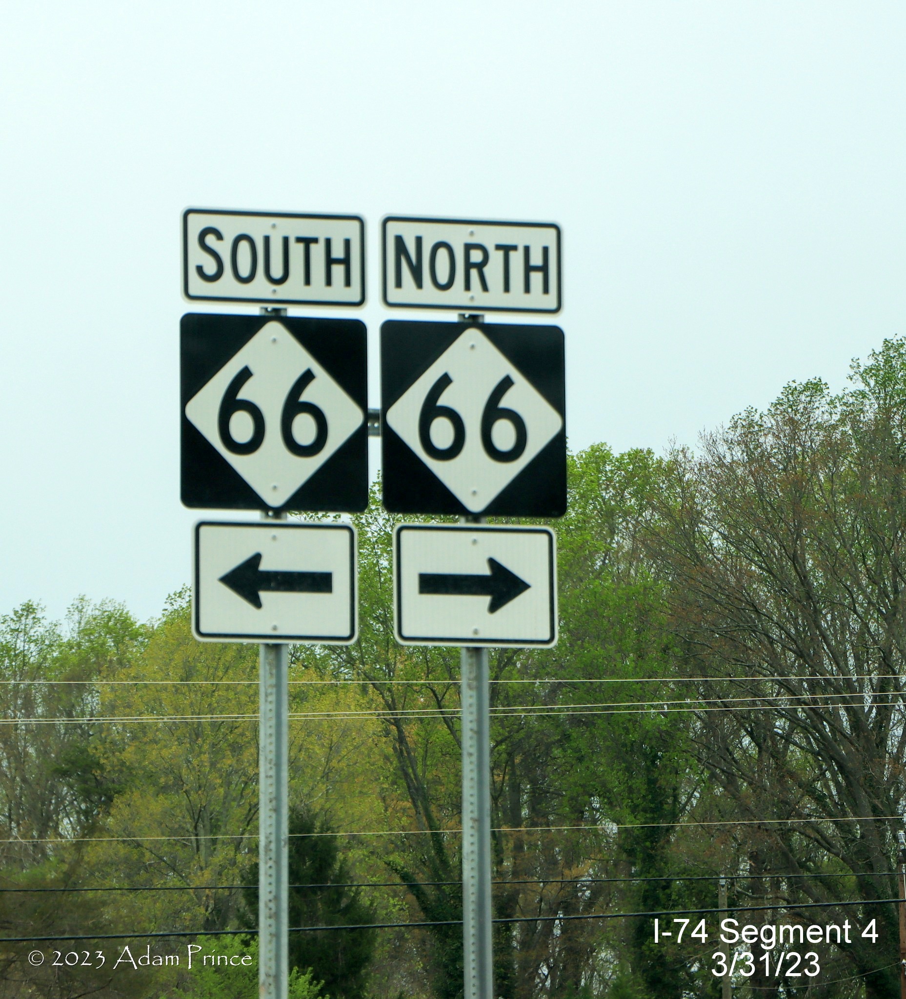 Image of a pair of NC 66 trailblazers at the end of NC 74 (Future I-74) West/Winston-Salem 
        Northern Beltway along the offramp, Adam Prince, March 2023