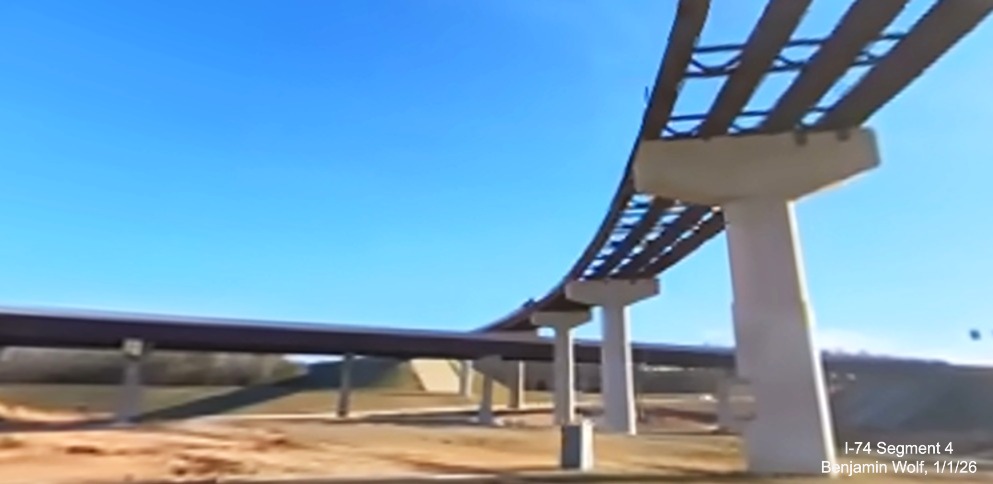 Image of steel beams in place for I-74 East to I-40 East flyover ramp in Winston-Salem
	  Northern Beltway interchange project work zone, screen grab from Benjamin Wolf video, January 2026