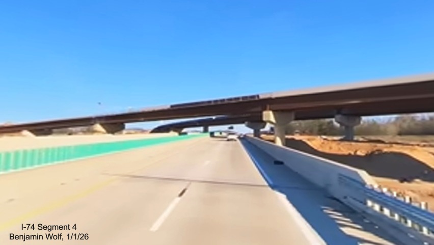 Image of flyover ramp construction from I-40 East in the Winston-Salem
	  Northern Beltway interchange project work zone, screen grab from Benjamin Wolf video, January 2026