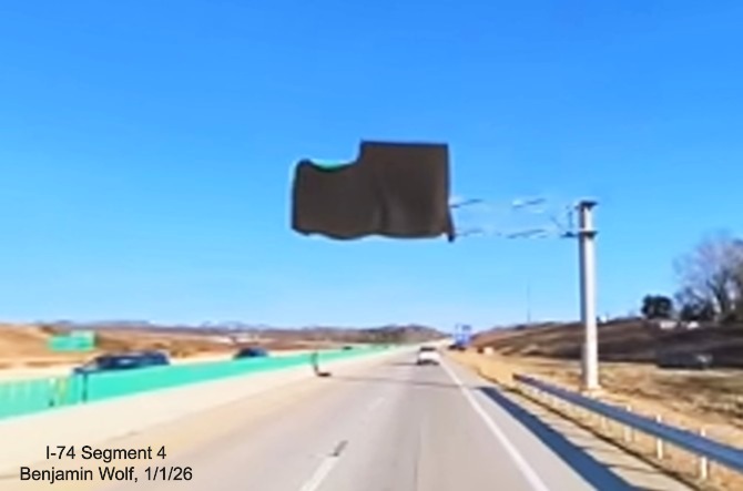 Image of covered over overhead sign for Union Cross Road exit on I-40 East in the 
	  Winston-Salem Northern Beltway interchange project work zone, screen grab from Benjamin Wolf video, January 2026